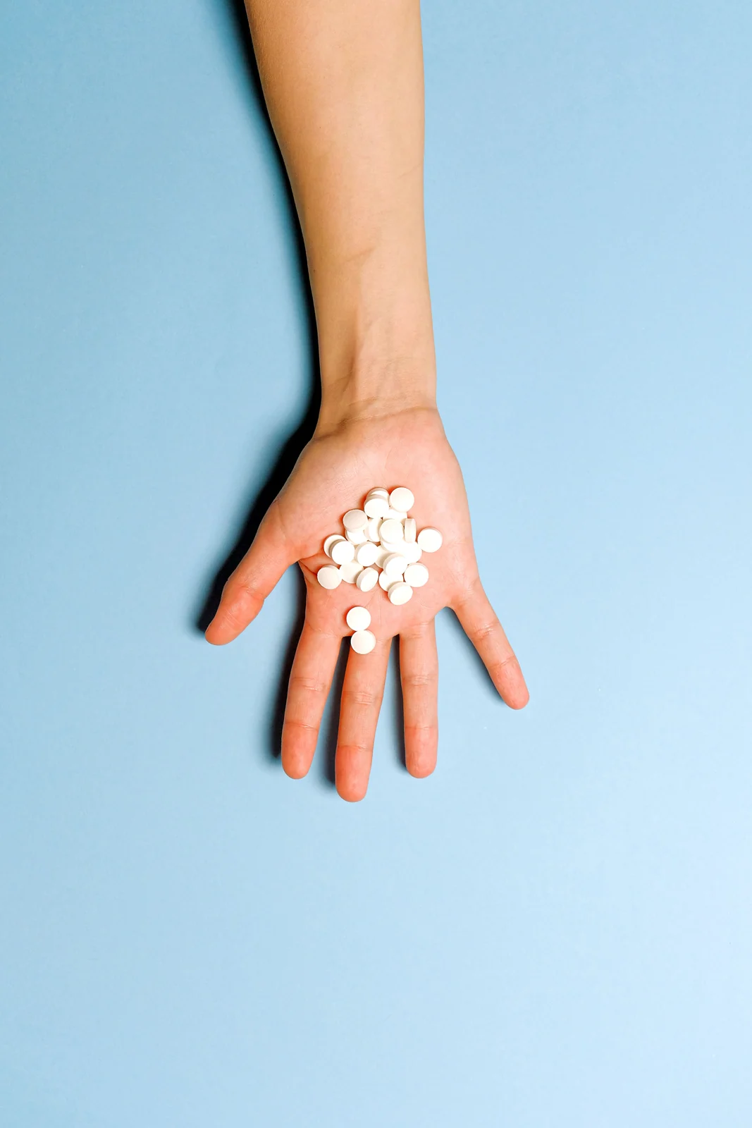 A single dose held in an open palm